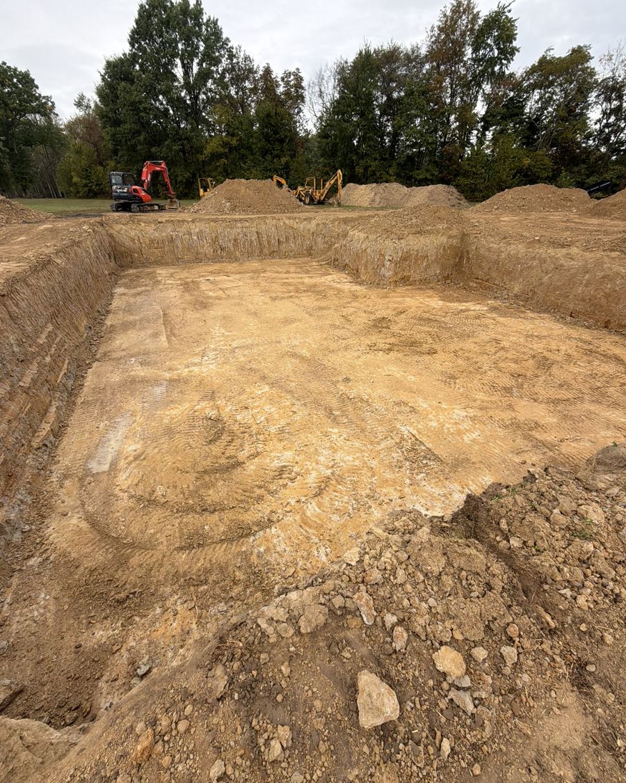 Finished basement excavation with a graded floor